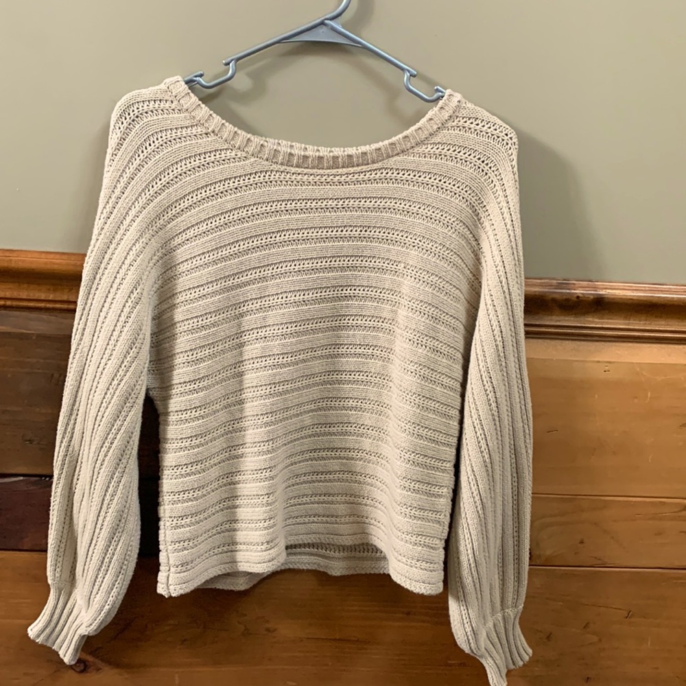 Beige/tan slightly cropped sweater.